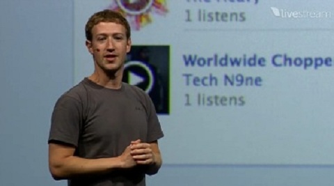 Mark Zuckerberg Speaks At F8 With Tech N9ne On Screen Behind Him
