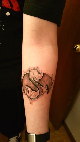 Tattoo uploaded by Trade Art Tattoo  Strange Music Logo  Tattoodo